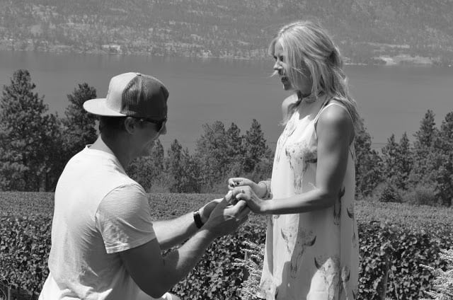 A man proposing to a girl on a wine tour with Beach Bum Tours