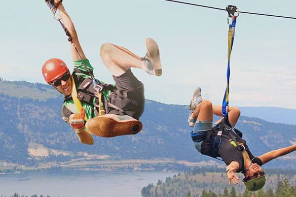 Guys Zip lining on the Beach Bum Zip and Sip Tour